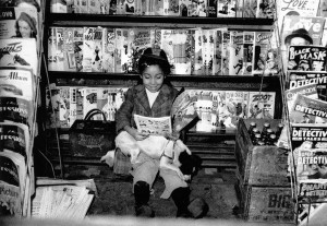 Girl reading comics via Getty Images