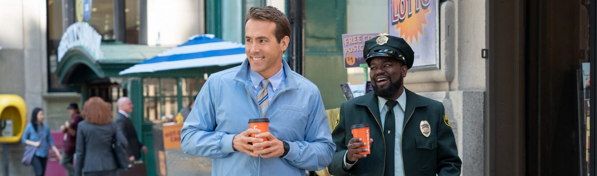 Ryan Reynolds as Guy and Lil Rel Howery as Buddy in Free Guy