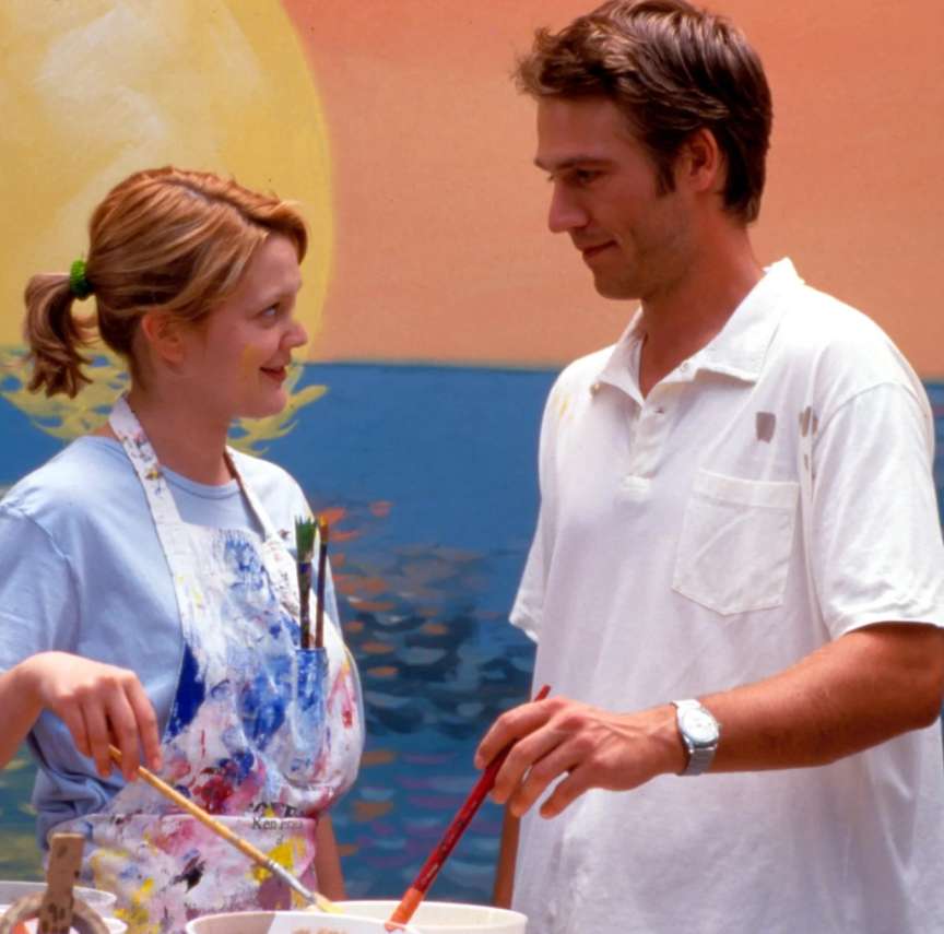 Josie (Drew Barrymore - L) paints in a meet cute with teacher Sam Coulson (Michael Vartan - R)