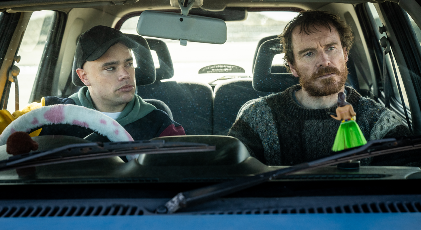 NAOISE Ó CAIREALLÁIN as Móglaí Bap or Naoise, MICHAEL FASSBENDER as Arló Ó Cairealláin in ‘Kneecap’ Image: Helen Sloan. Courtesy of Sony Pictures Classics