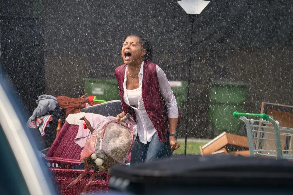 Taraji P. Henson as Janiyah yells at the sky and rain.