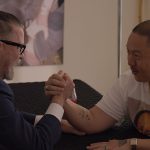 Vice Co-Founder Gavin McInnes arm-wrestles with director Eddie Huang in a scene from VICE IS BROK