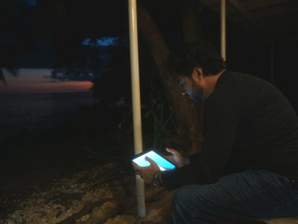 Director Adam Bhala Lough ponders his options in a scene from DEEPFAKING SAM ALTMAN.